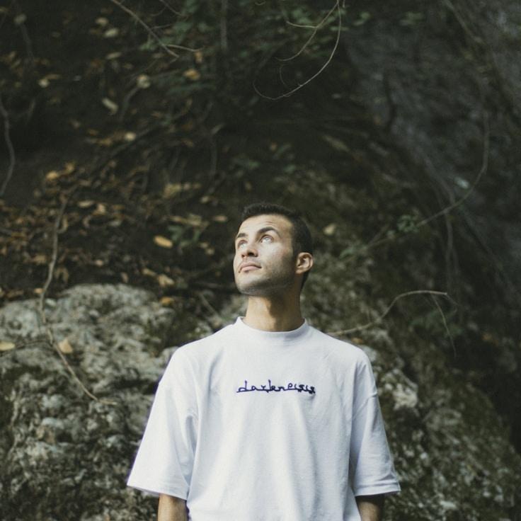 Kaveri Mehta, Lead Design Curator at Summit Bridge Pro, reviewing corporate floral arrangements